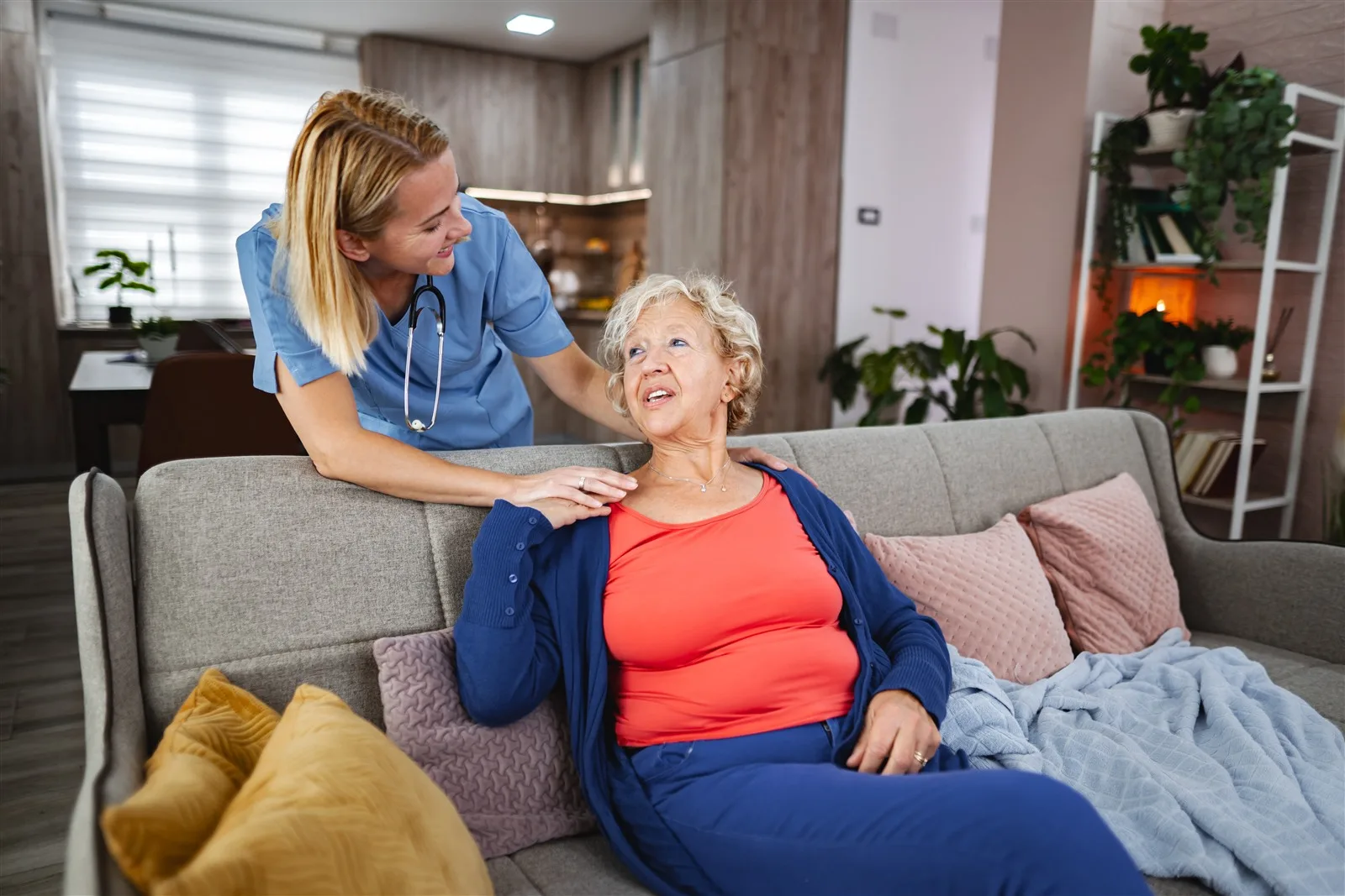 Coming Home from Hospital: Arranging Care and Support Carer visiting an older woman at home